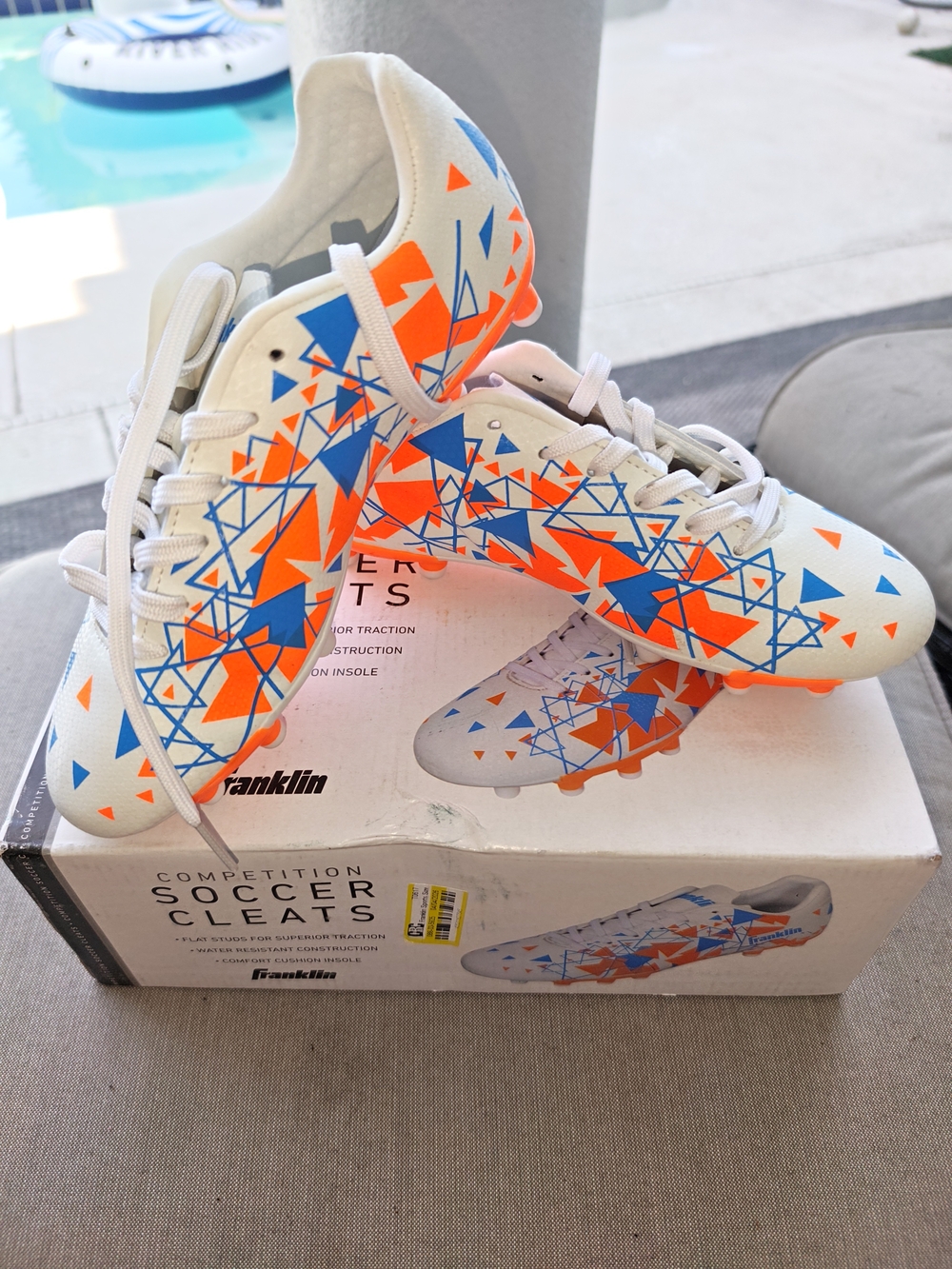 Franklin Kids White Soccer Cleats with Blue & Orange Graphic Print